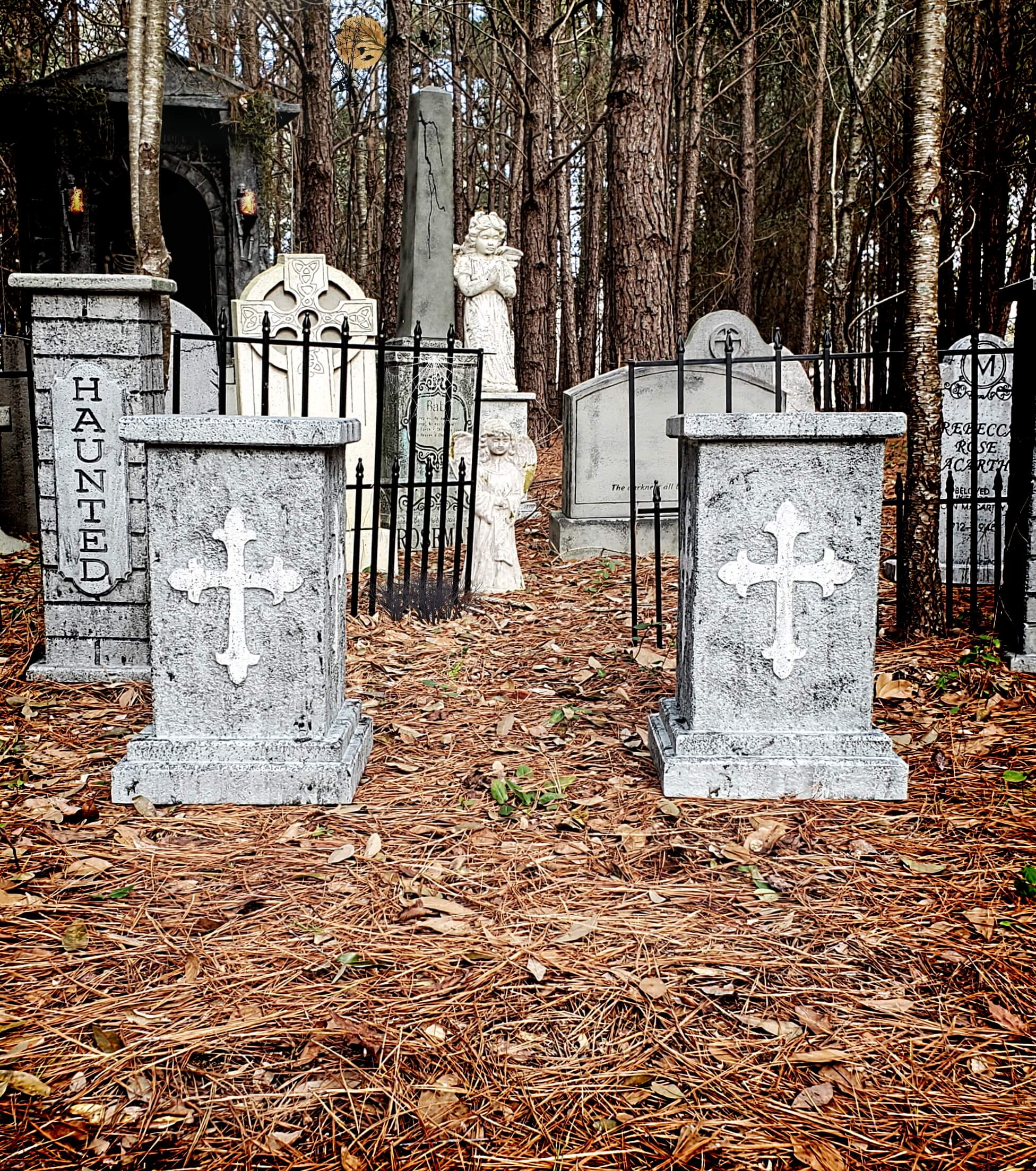 Two weathered stone graves with Orthodox crosses in a forest cemetery. Two weathered stone graves with Orthodox crosses in a forest cemetery.