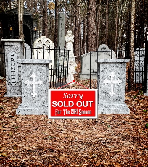 A graveyard with a sold-out sign on a tombstone. A graveyard with a sold-out sign on a tombstone.