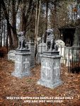 A graveyard with a sold-out sign on a tombstone.
