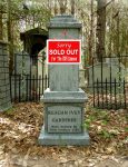 A historical monument marked with a ‘Sold Out’ sign.