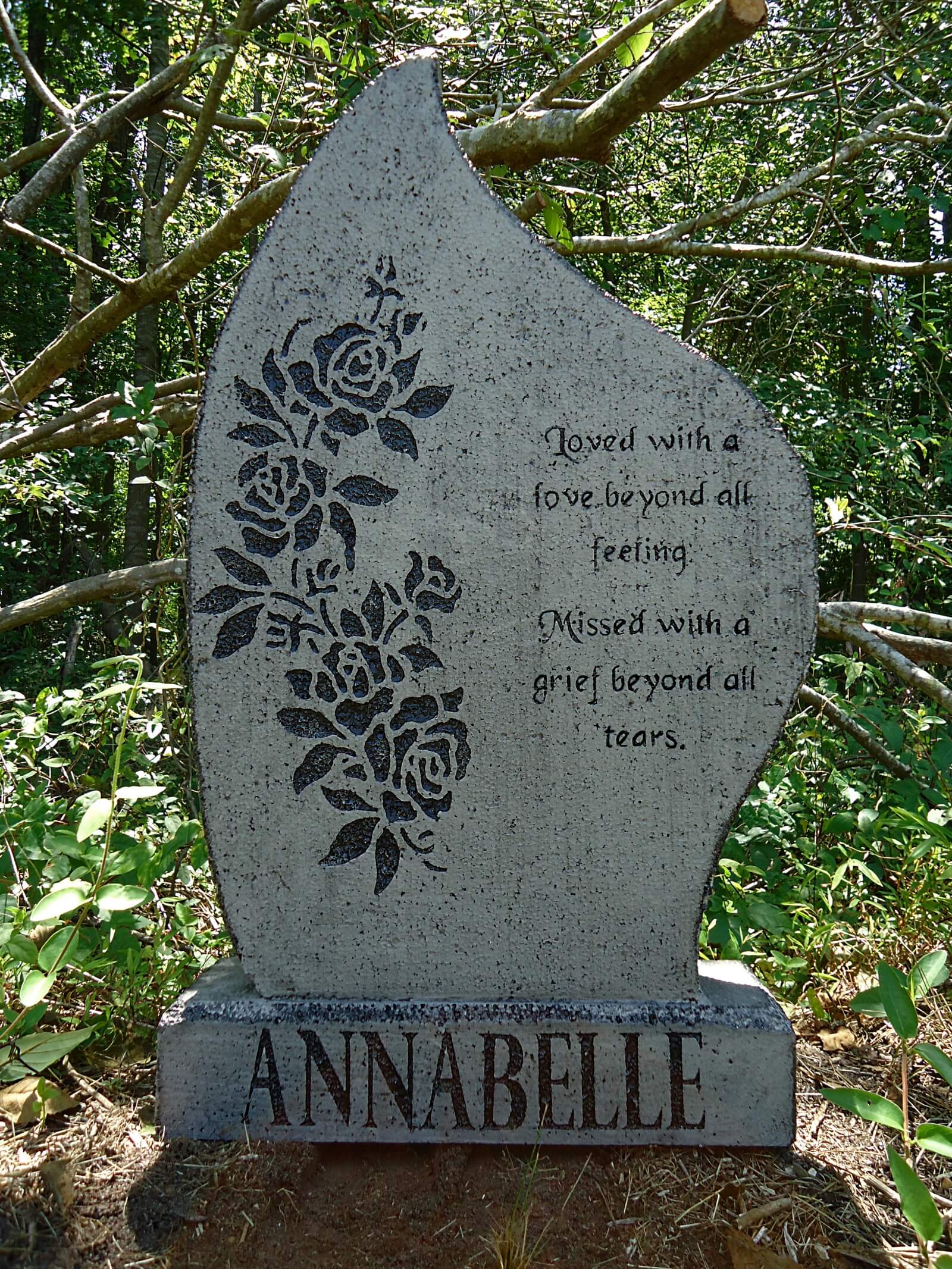 A gravestone with floral design and the name Annabelle. A gravestone with floral design and the name Annabelle.