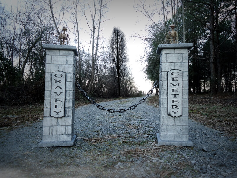 Entrance gate with stone pillars and chain barrier. Entrance gate with stone pillars and chain barrier.
